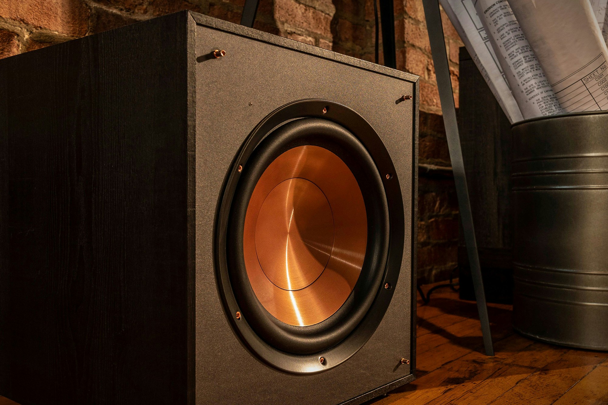 R 120sw subwoofer on wood floor